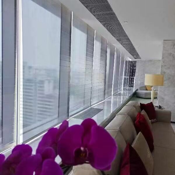 Beijing Shiji Information Headquarters: window front with roller shades and orchids in the foreground