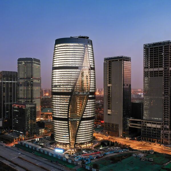 Soho 5G Exhibition Hall reference: high-rise with a twisted glass façade at dusk, Beijing