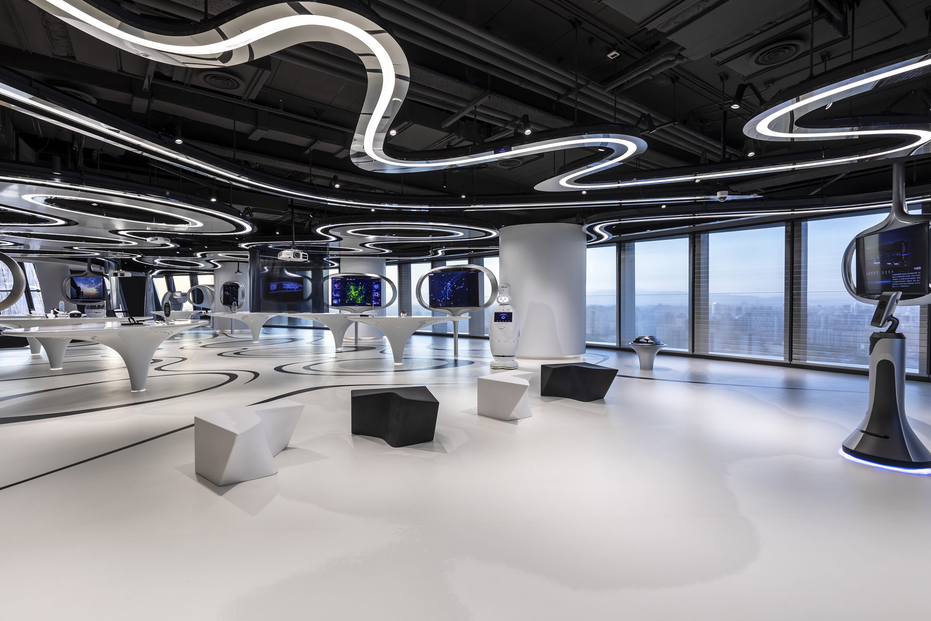Exhibition area of the Soho 5G Exhibition Hall in Beijing with curved ceiling lighting