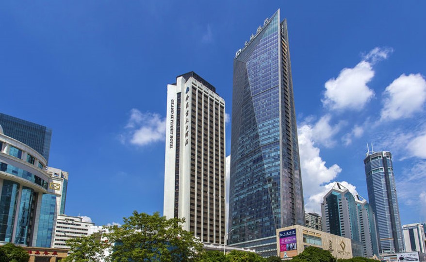 Bank of Communications Shenzhen Headquarters high-rise against a blue sky