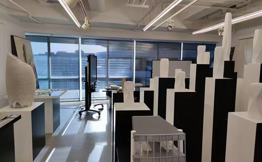 Workspace with architectural models at the Zaha Hadid Architects China Headquarters, Beijing